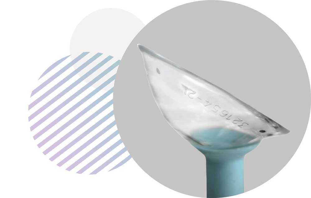 A custom Visionary Optics scleral contact lens held by an inserter